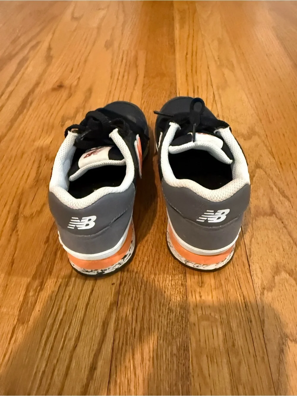 New Balance Kids Black and Orange Low-Top Sneakers